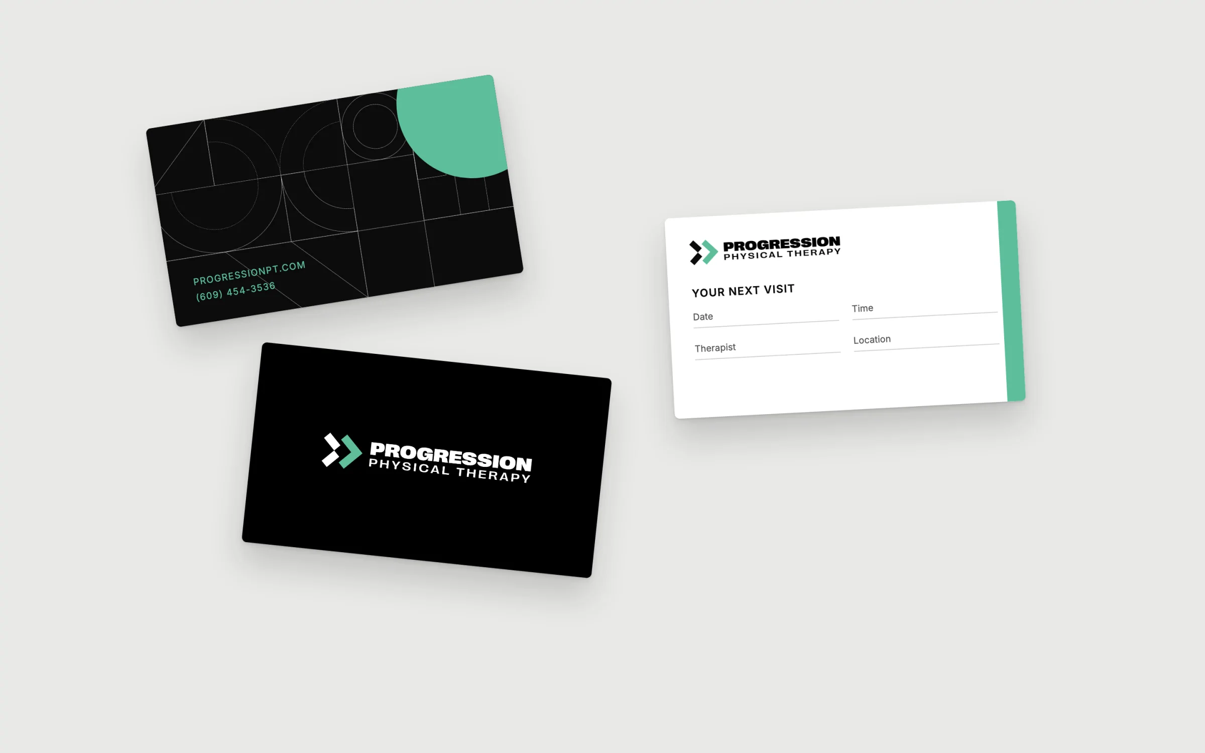 Business cards and an appointment card in black, green and white
